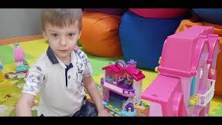 Danila Master with his sister Margarita playing in an amusement park