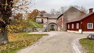 Sweden Walks: Medieval ruin and riverside of Nyköping in autumn colors.