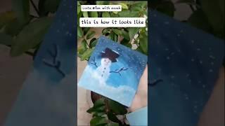 Painting snowman on canvas