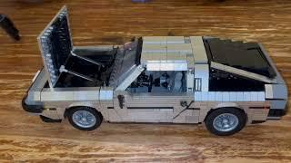 Zeitloses Edelstahl Coupé (BlueBrixx-Special 107706) + Upgrade Kit (107707) vs. Lego 10300 Delorean