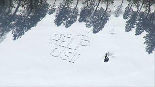 Large 'HELP US!!' message spotted in SoCal snow as some residents grow desperate