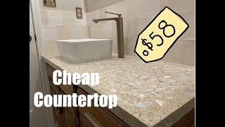 Countertop under 100 dollars . Keep your money and just DIY it. It’s very durable!