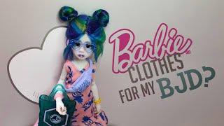 Can a BJD wear Barbie clothes?