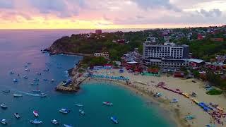 Full beach from Punta Zicatela to Playa Principal at sunset. Puerto Escondido Mexico. Mexican tours.