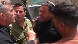 The criminal  Jewish settler Ofer  Hanna attacks Palestinian residents in Hebron