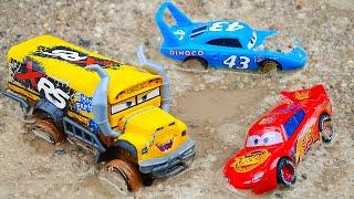 Disney Pixar Cars fall into the water: Lightning McQueen, Tow Mater, Dinoco, Jackson Storm