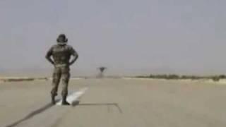 Fearless man facing extra low fighter jet flyby