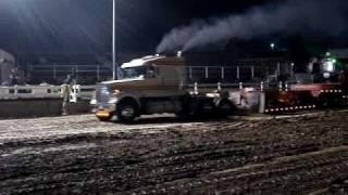 Willie Scheanon pulling his Volvo at Lawarence County in the mud