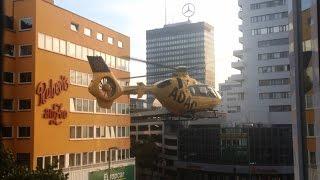 Gelber Engel ADAC Hubschrauber Start Helicopter lift off in Berlin Kurfürstenstraße Europacenter