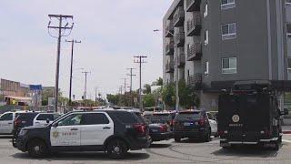 South LA shooting suspect barricaded in apartment building