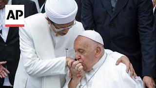 Pope Francis kisses hand of Jakarta mosque's grand imam after interfaith meet in Indonesia