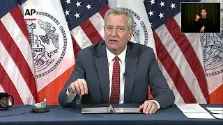 NYC to reopen schools, even as virus cases spike