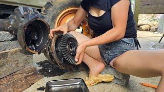 Female repair genius CaCa: Restore and repair a 4WD diesel tractor with a front axle oil leak.