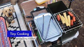 Cooking itty-bitty foods on the mini ammo can camp kitchen - tiny hot dogs, chicken & waffles