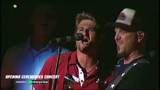 Arkansas infielder Hunter Wilson on Stage with LOCASH at the CWS Opening Ceremony