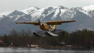 Cessna 172 Float plane doing touch and gos at Lake Hood, Alaska.