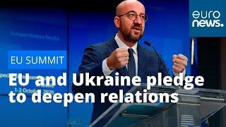 EU and Ukraine pledge to deepen relations, call on Russia to respect peace deal