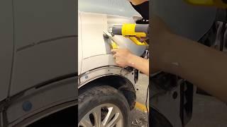 The process of removing paint from a car
