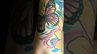 female arm tattoo #butterflytattoo #flowerstattoo