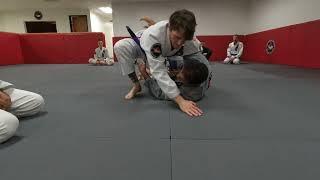 CONNECTION in half guard bottom