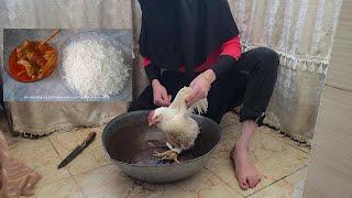 woman butcher chicken and cooking meat with rice/miss Nahila routine
