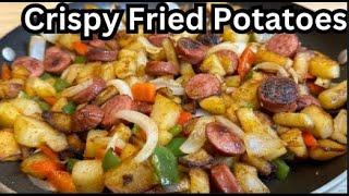 Delicious Fried Potatoes Onions And Smoked Sausage