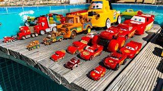 Disney Pixar Cars falling into deep pool, Lightning McQueen, Tow Mater, Mack, Sally, Francesco