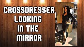 Crossdresser looking in the mirror