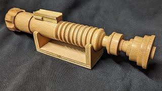 Wood turning a light saber and Holy Grail.