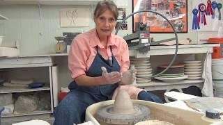 Centering clay on the pottery wheel by porcelain artist, Antoinette Badenhorst