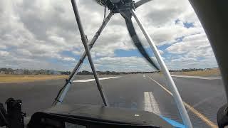 Massive runway for a tiny plane! Ultralight lands on big runway in Tasmania.