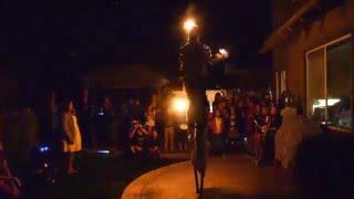 Juggling Fire on Stilts by Cirque Quirk