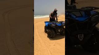 Riding an ATV on Senegalese beach 