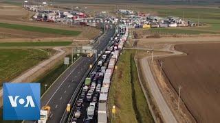 Massive Truck Lines at Hungary Romania Border Over Coronavirus Concerns