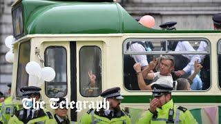 Extinction Rebellion protesters block London Bridge with bus