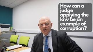 How can a judge applying the law be an example of corruption?