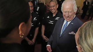 King Charles can't hold back his laughter after group hug from New Zealand rugby team