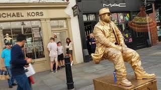 Golden man London | street performer | floating and levitating trick Covent Gardens