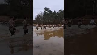 Soldiers crossing water