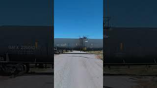 2 UP Locomotives with 40 freight cars traveling at a speed of 43 MPH