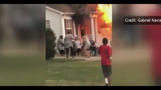 VIDEO: Neighbors pull NC woman from house fire