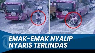 NYALIP LEWAT TROTOAR, Pemotor Wanita Ini Nyaris Terlindas Bus