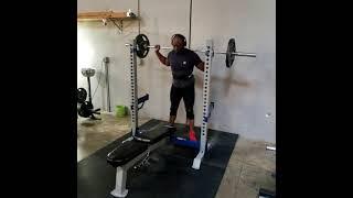 Squats on a Fitness Gear Pro OB 600 Olympic Weight Bench