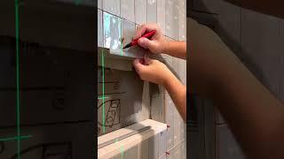 Installing a tile shower soap niche using our patented trim square #tiling #howto #tile #diy #niche