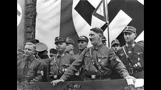 World War II: Hitler abolished the Treaty of Versailles and began rearmament.