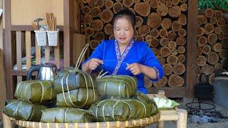 Wrapping lots of giant banh chung to make a meal for Vietnamese mountain people