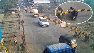 Motorcycle Rider Crashes Into Level Crossing In India