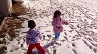 Evangelina and mala Playing Snow