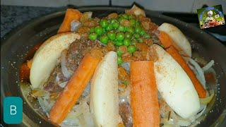 Tayin de carne de cabra con verduras  طجين لحم الماعز بالخضر.