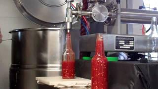 Hot Sauce Being Made And Bottled From The Hot Sauce Masters.